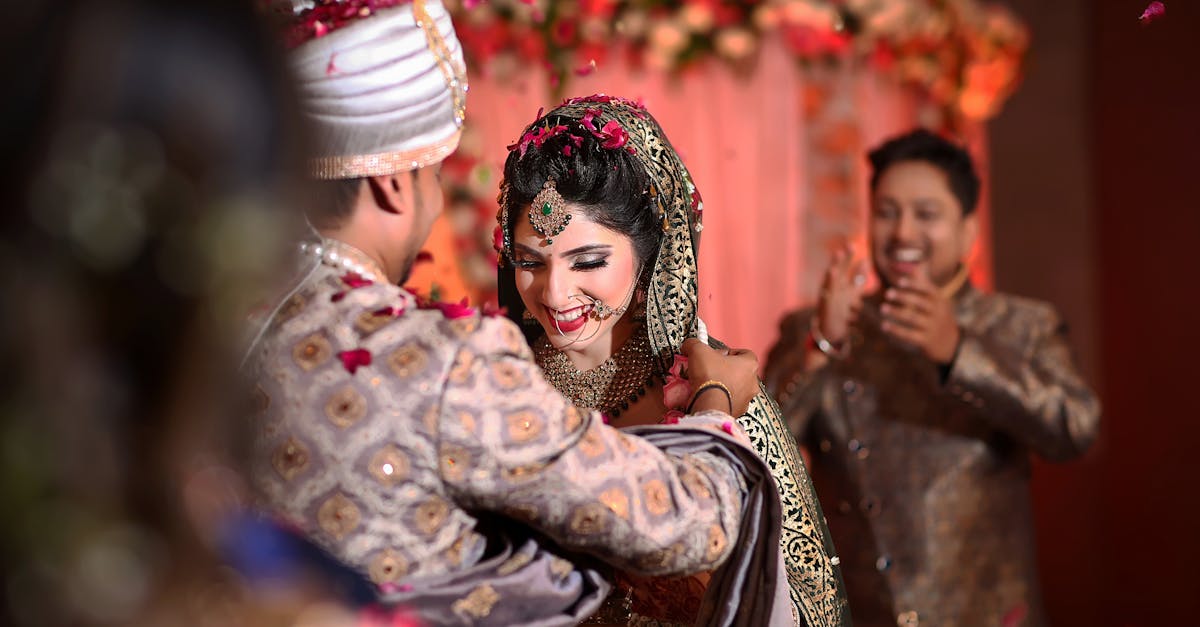 Joyful Indian couple sharing a heartfelt moment during their wedding ceremony.